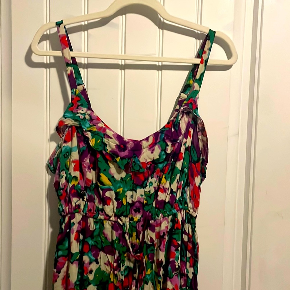 Floral multi color high low dress with ruffle on top. Like new